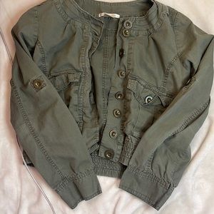 Green denim jacket.
